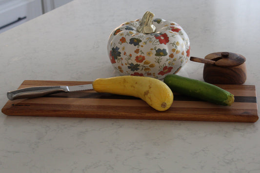 Canary wood, European Beech, and Peruvian Walnut board with zucchini.