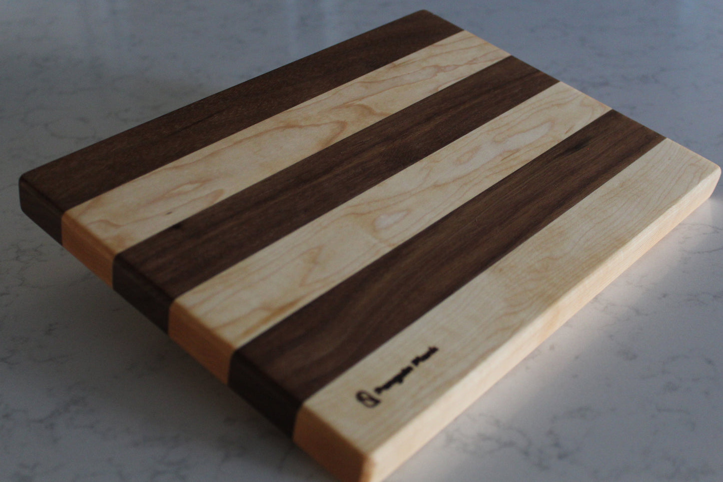 Maple and walnut picnic cutting board.