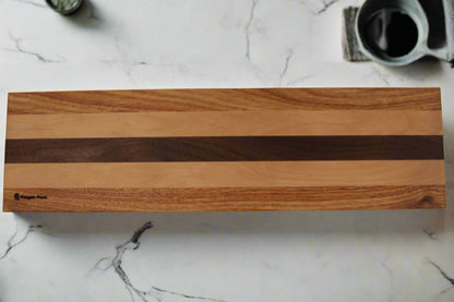 Canary wood, European Beech, and Peruvian Walnut serving platform.