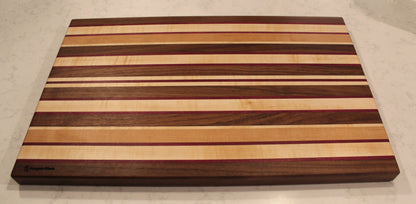 Large Wood Cutting Board, made from a unique blend of Walnut, Maple, Cherry, and Purpleheart strips.
