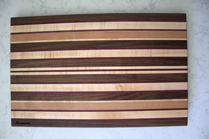 Large Wood Cutting Board, made from a unique blend of Walnut, Maple, Cherry, and Purpleheart strips.